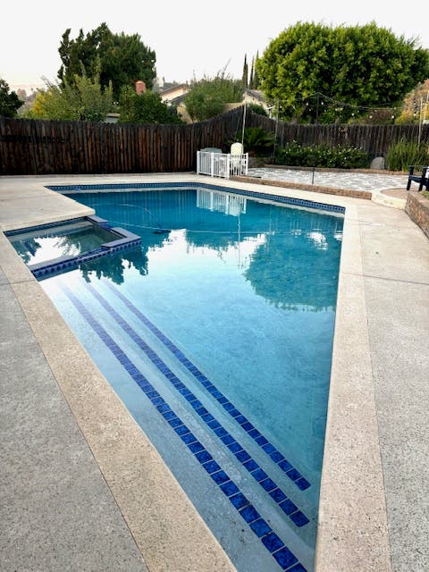 Elegant Poolside Retreat Photo 2