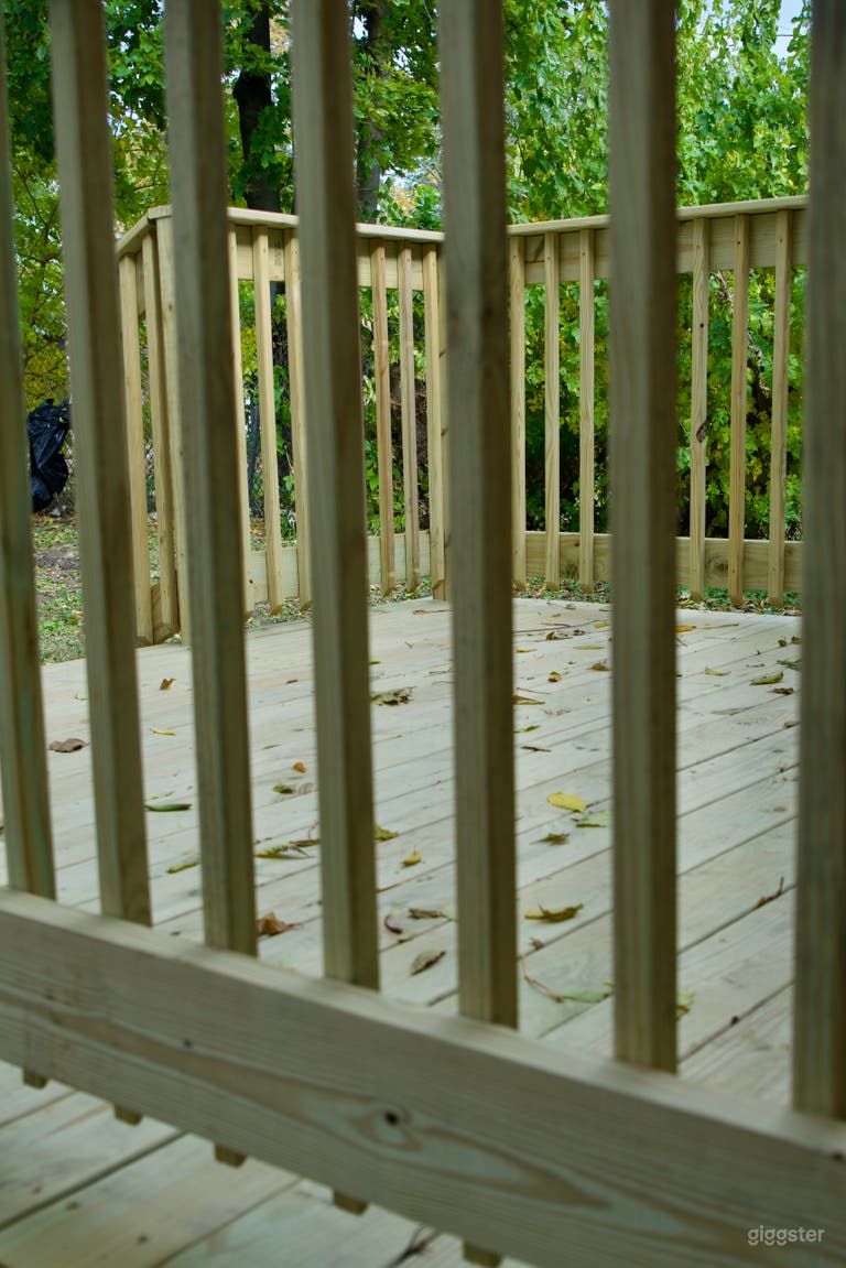  Spacious wooden deck in the backyard. 