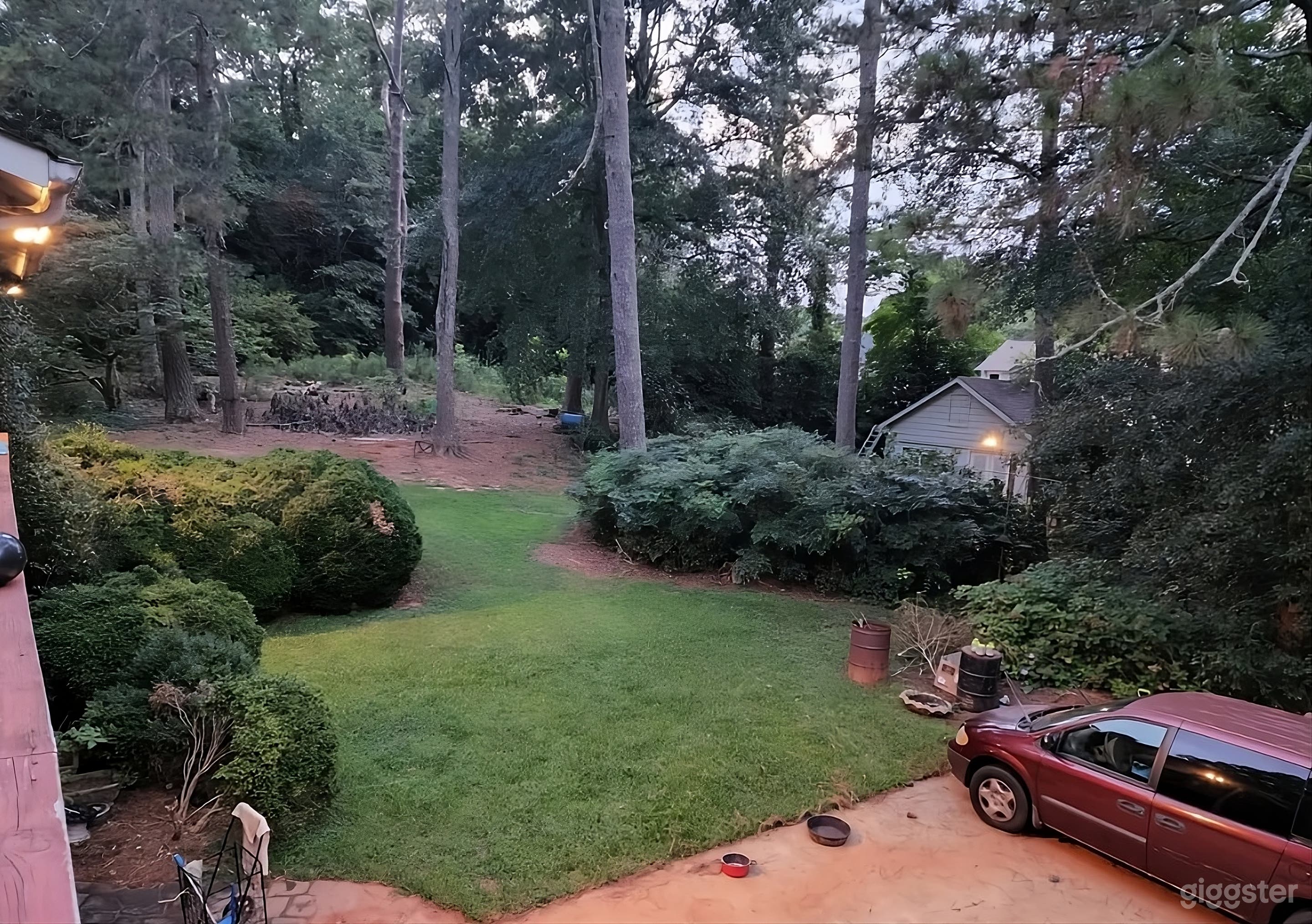 Charming and Expansive Wooded Backyard Photo 2