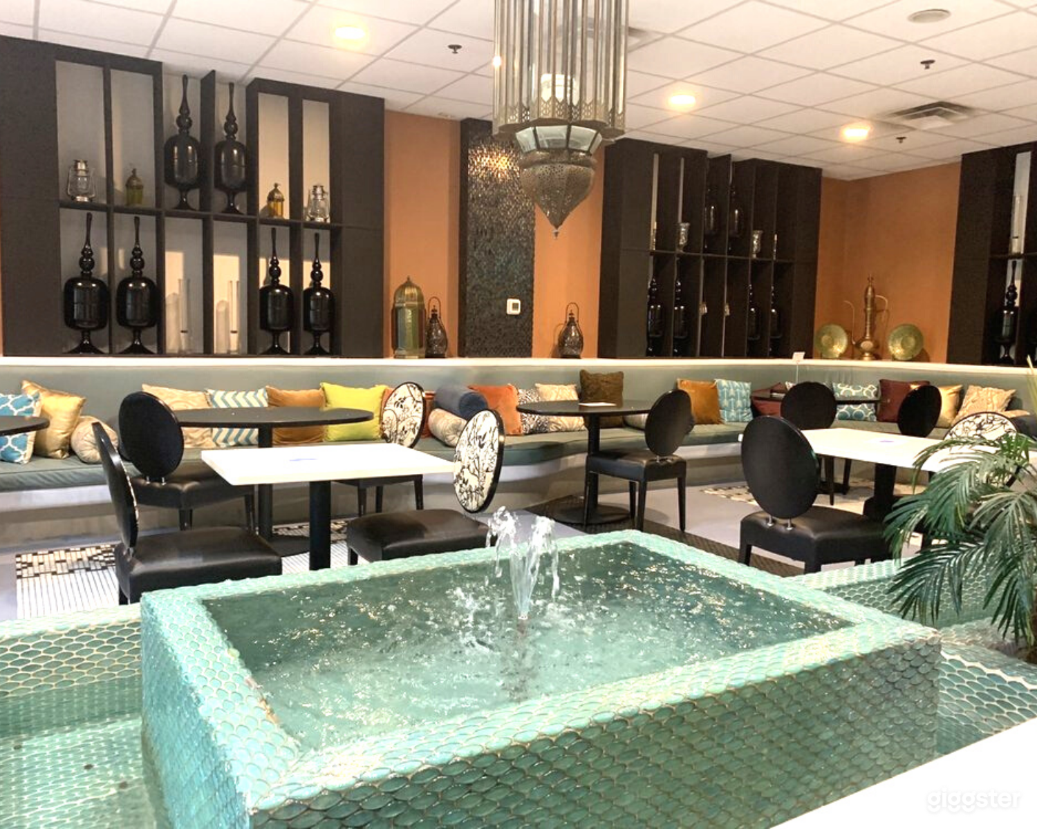 High ceilings, Contemporary Mediterranean / Middle eastern decor. Fountain. 