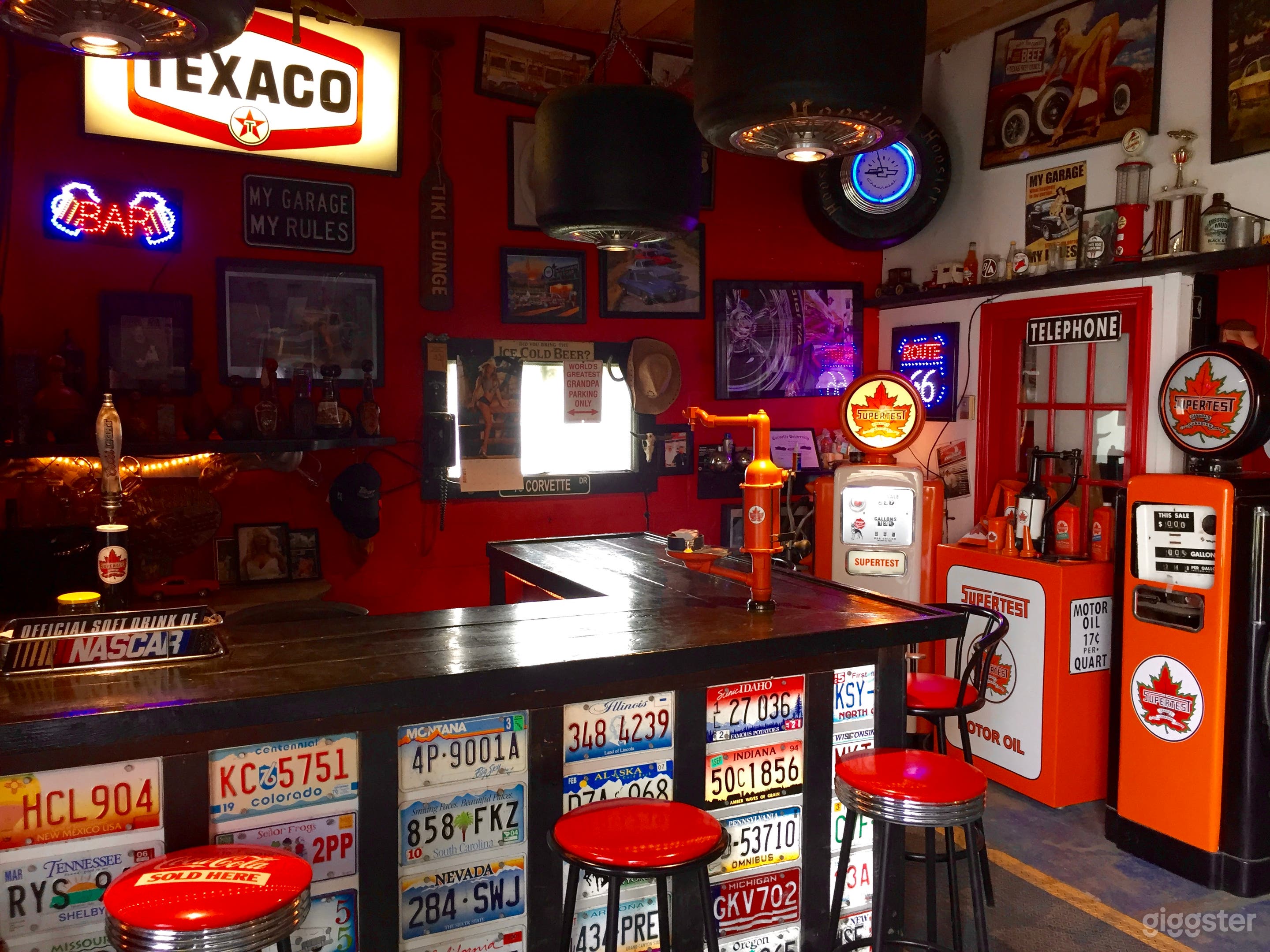 Man Cave Barn With Vintage Car Decor Photo 1