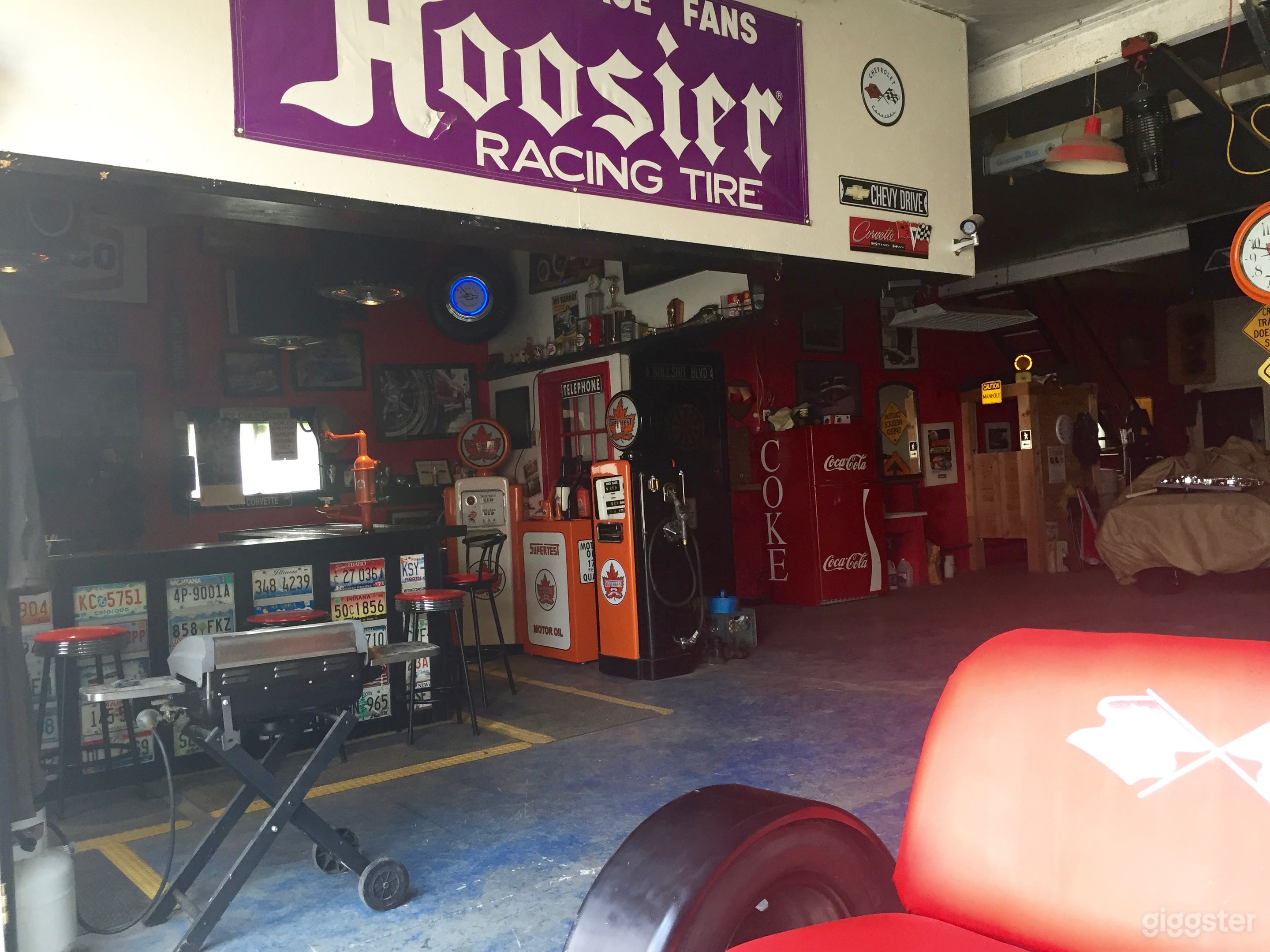 Man Cave Barn With Vintage Car Decor Photo 2