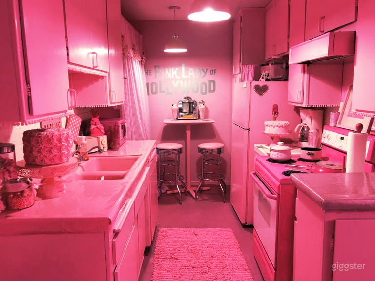  The kitchen at The Pink Palace. (pink sink and pink stove)  