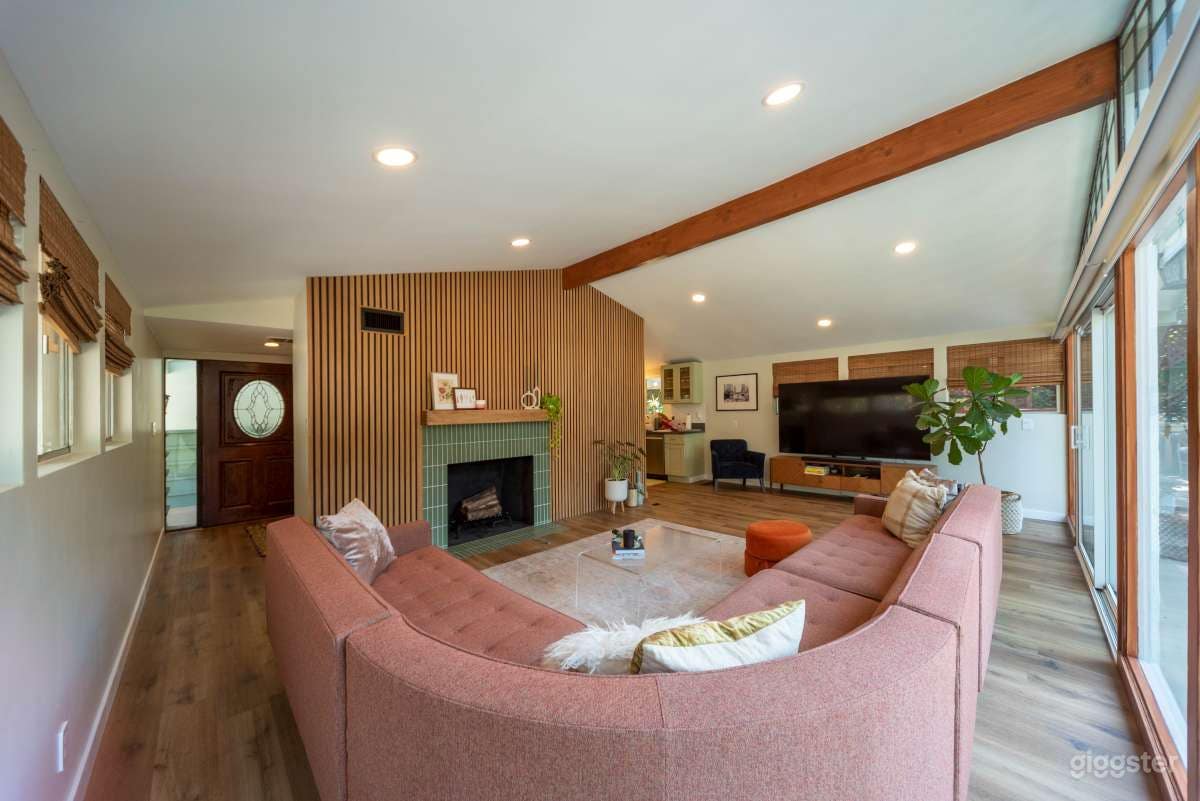 Bright Midcentury Modern Treehouse with Large Deck Photo 3