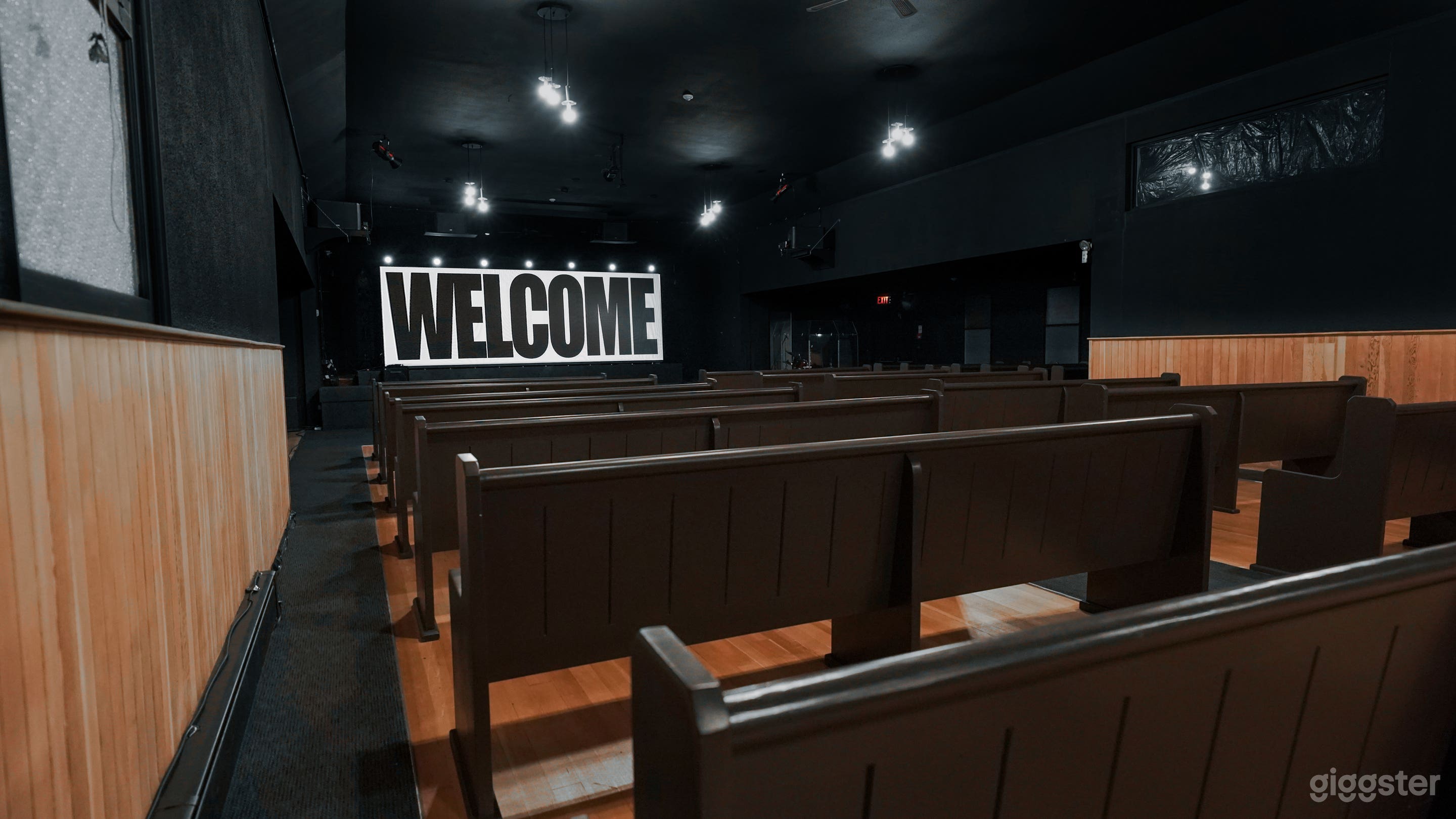 Modern Chapel-Style Event Hall with Stage &amp; Seating Photo 4