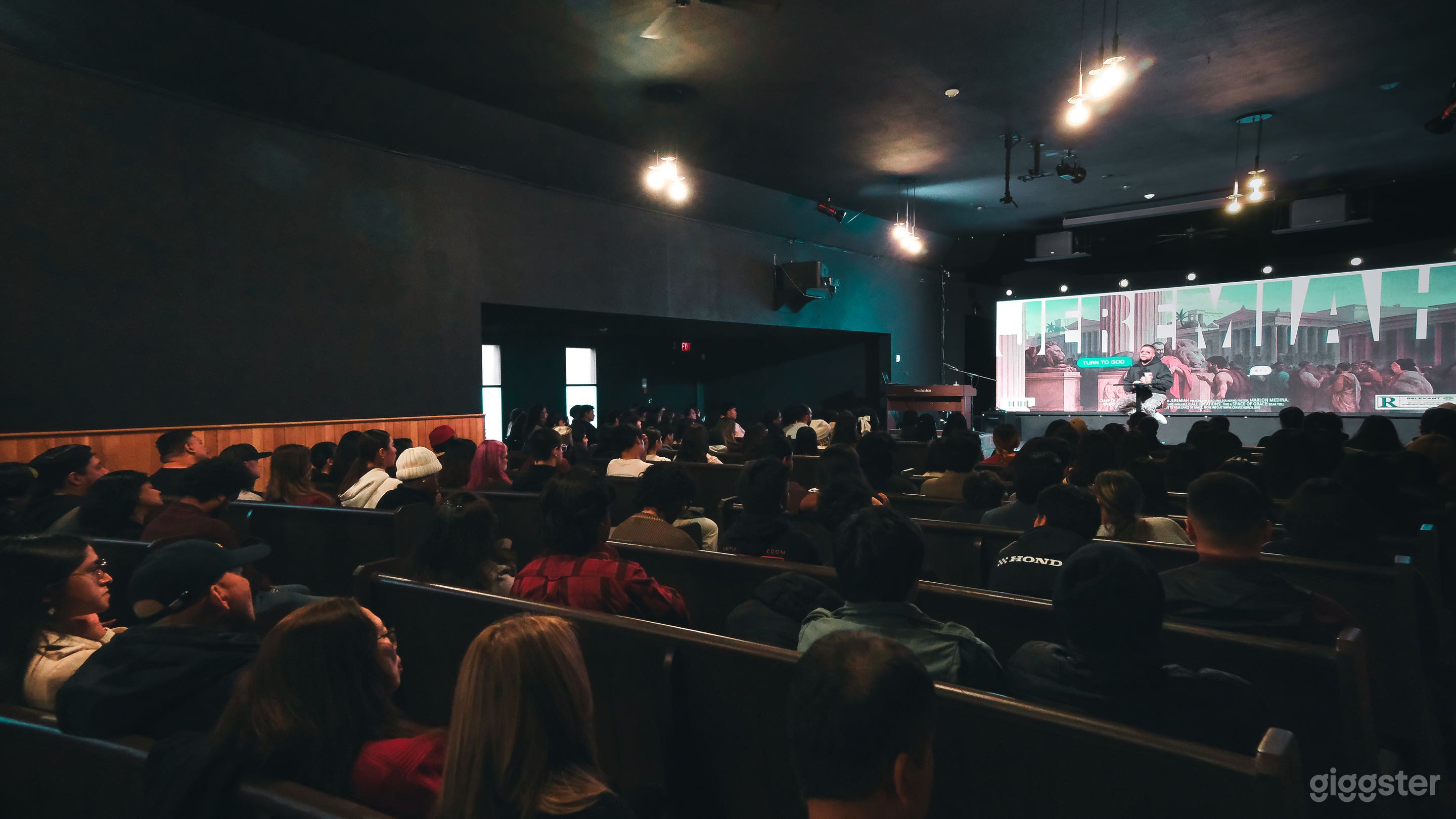 Modern Chapel-Style Event Hall with Stage &amp; Seating Photo 2