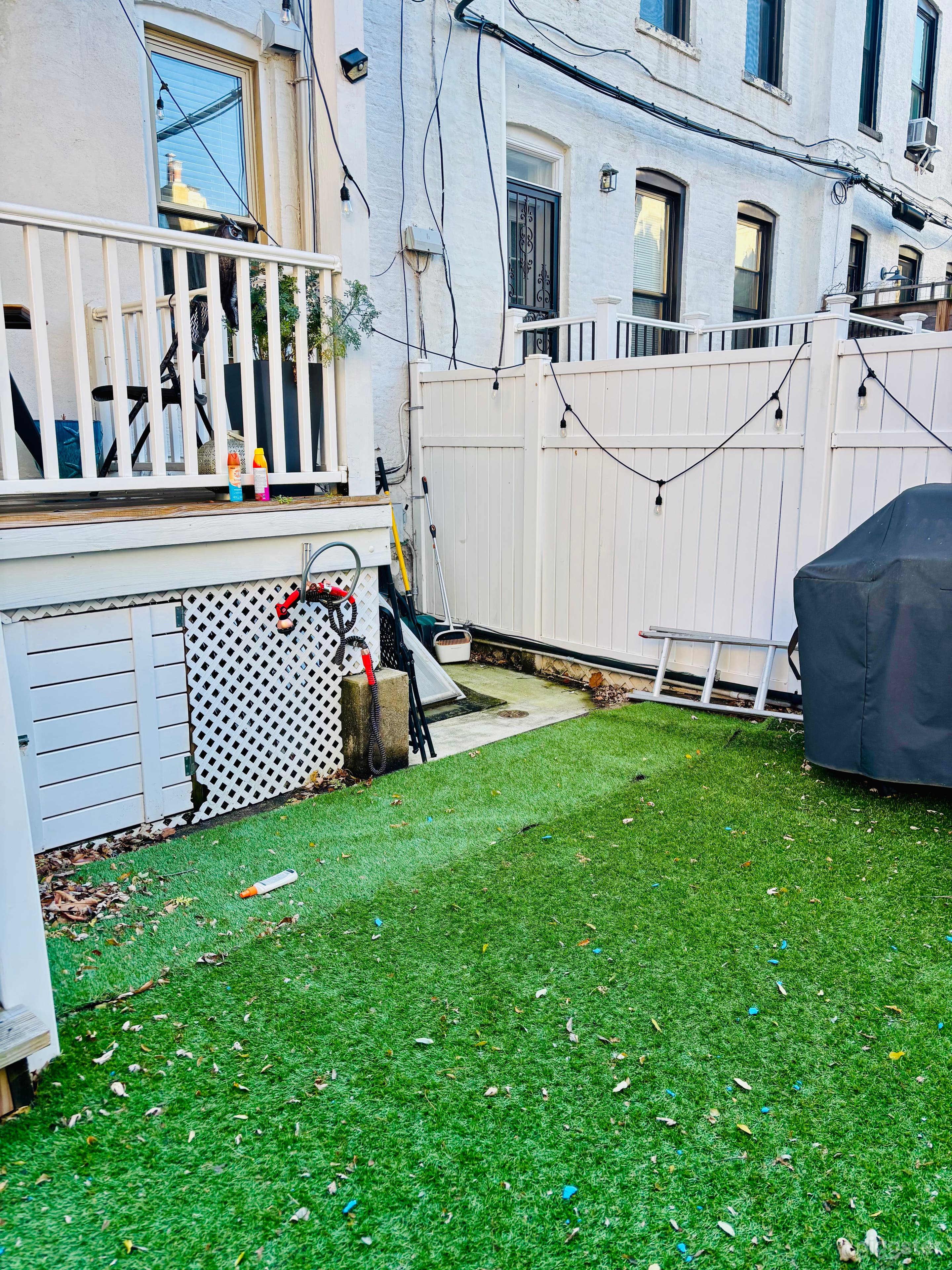 Charming and Cozy Fenced Backyard Photo 4