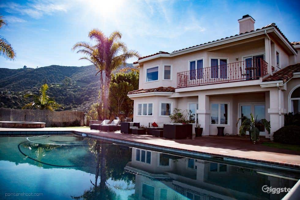 Elegant Pool in a Mediterranean Home perched atop a hill  Photo 2