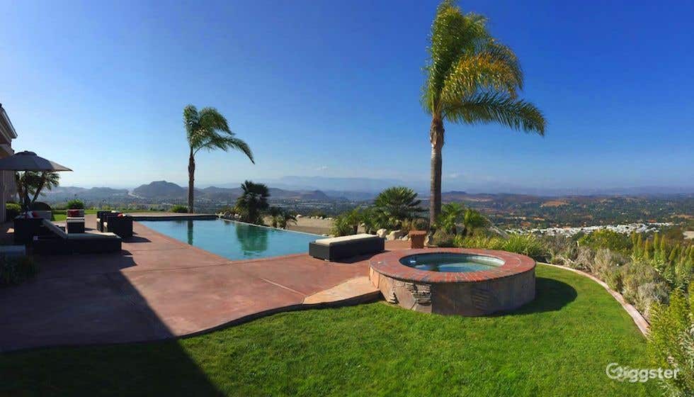 Elegant Pool in a Mediterranean Home perched atop a hill  Photo 4
