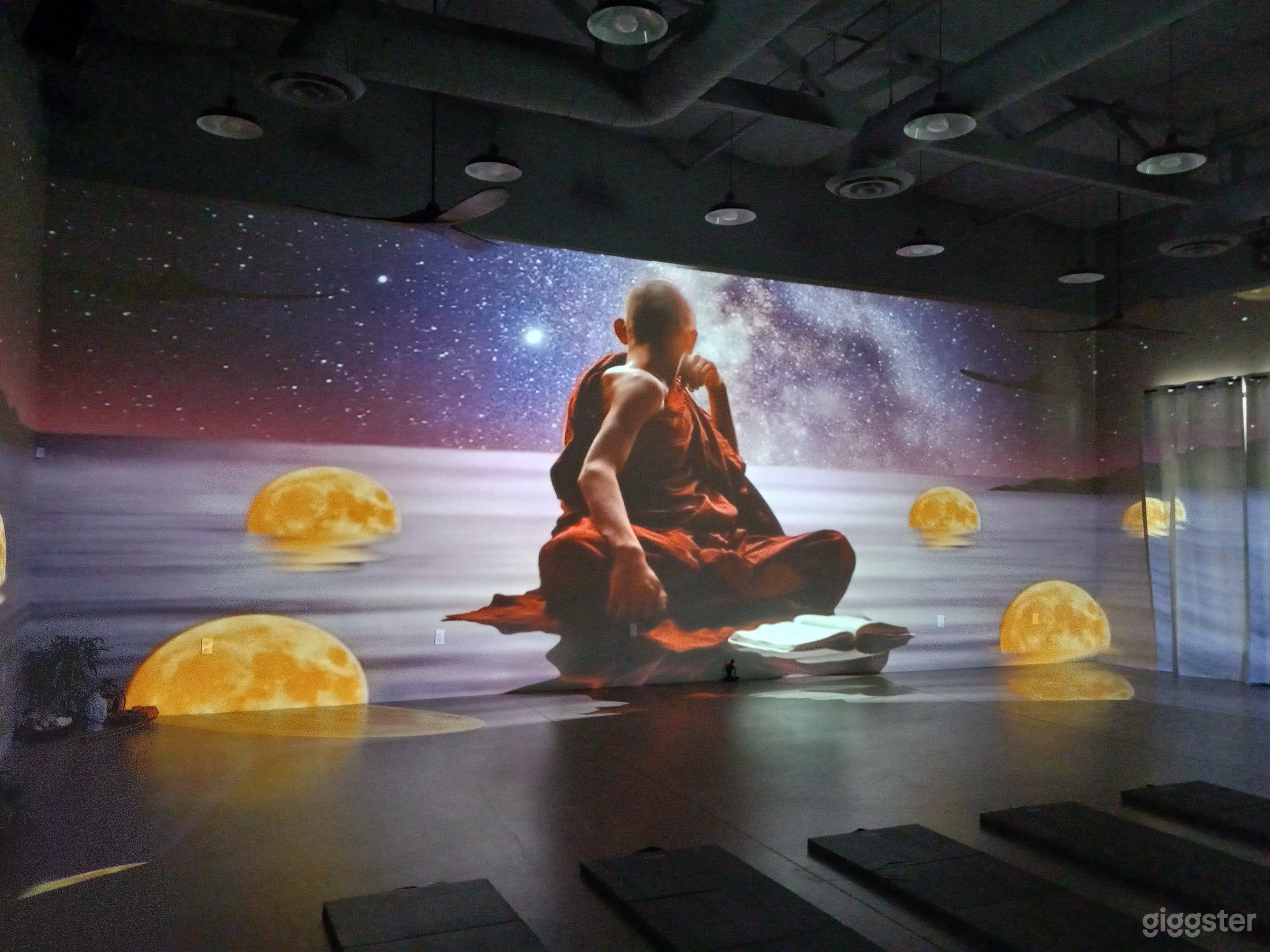 Playing a cleansing frequency immersive studio wall