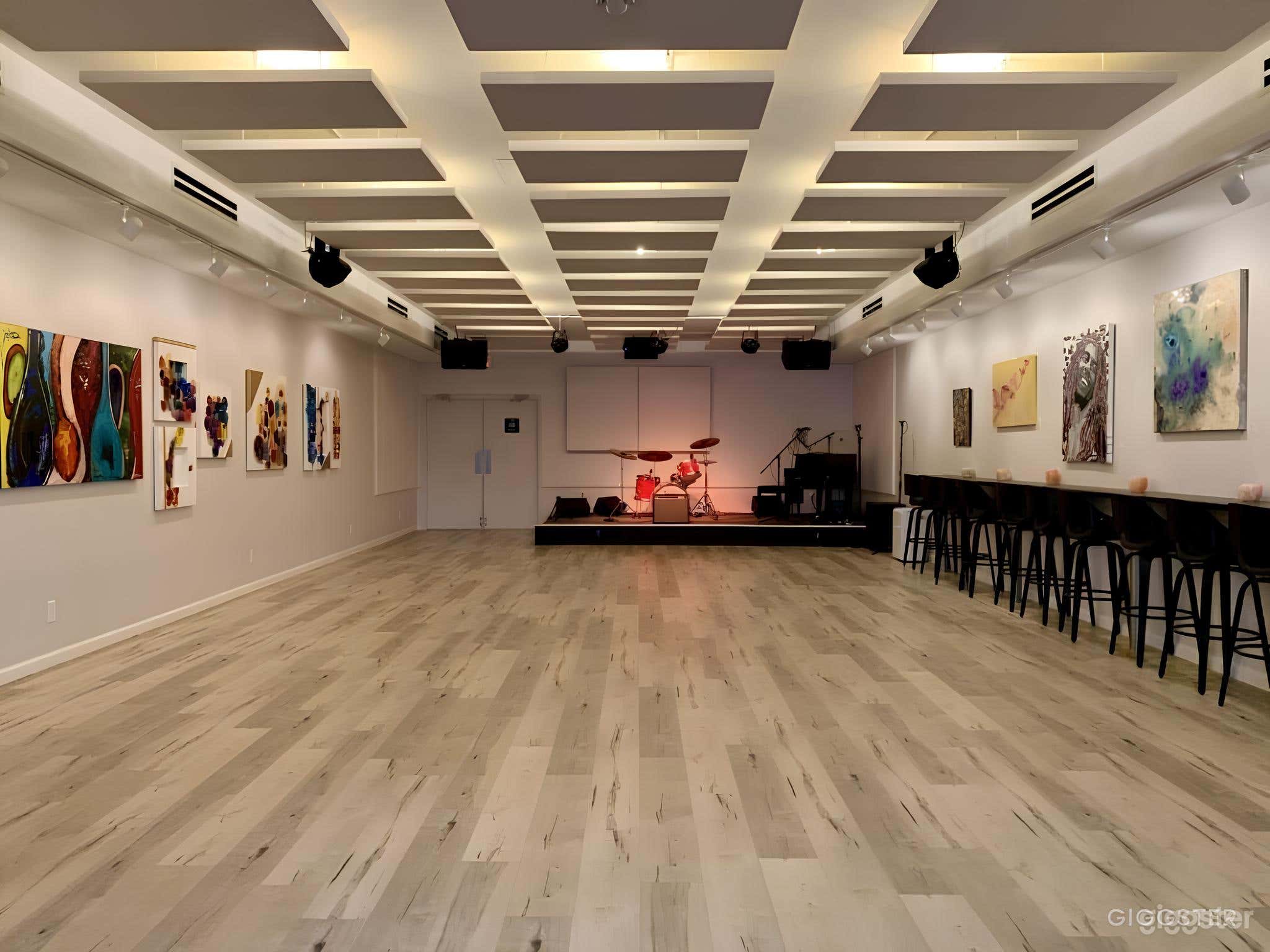 Our entire space -- located in the heart of Lake Highlands -- is 2,000 square feet designed with great acoustics and a 98″ TV for movies + presentations or group meetings! 