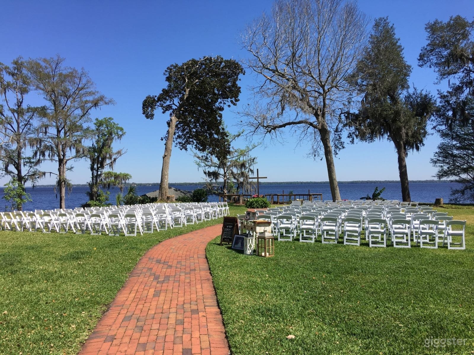 Historic Riverfront Backyard with Lush Oaks Photo 1