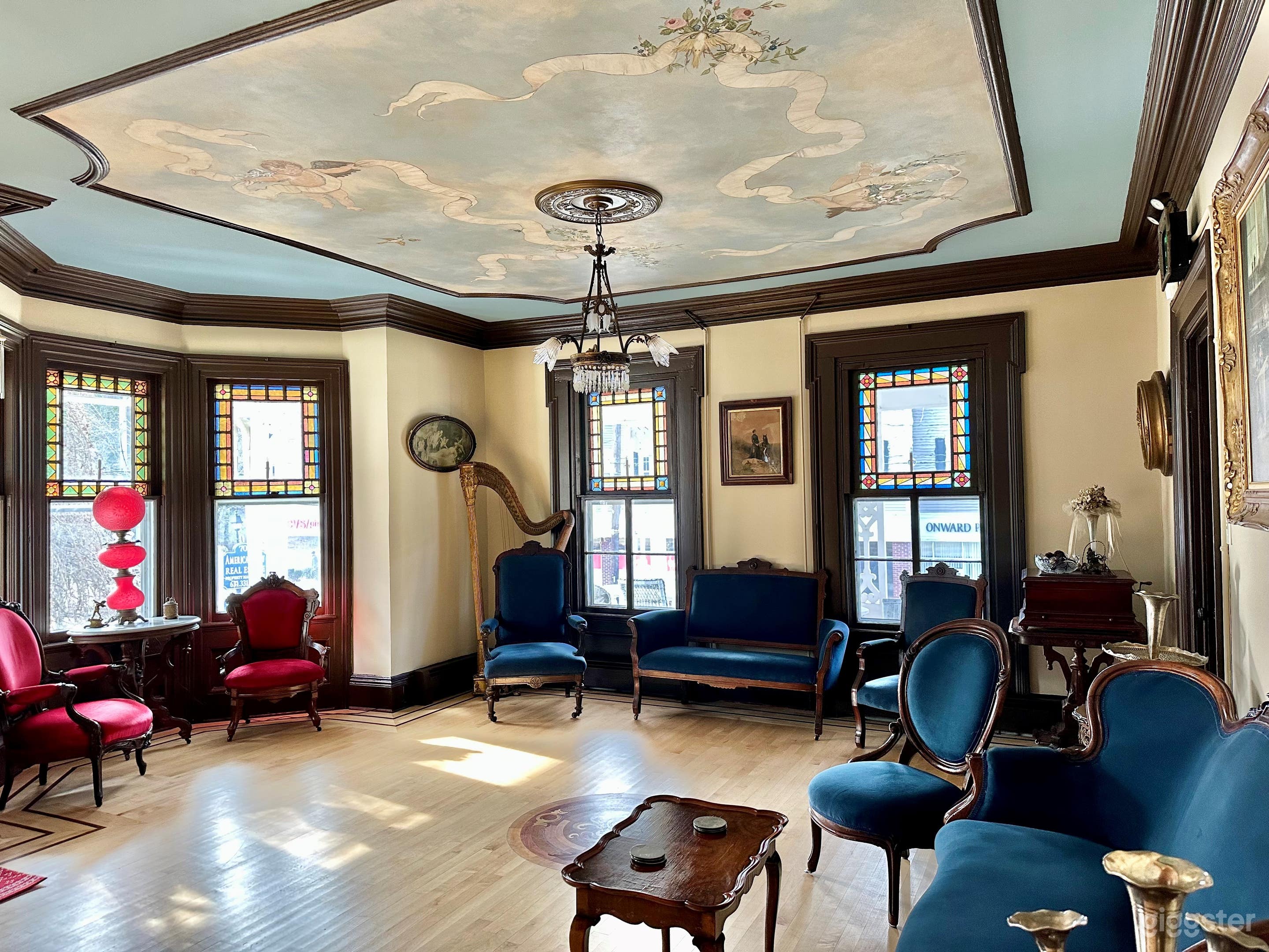 Victorian Front Parlor with Ceiling Mural and period furniture.