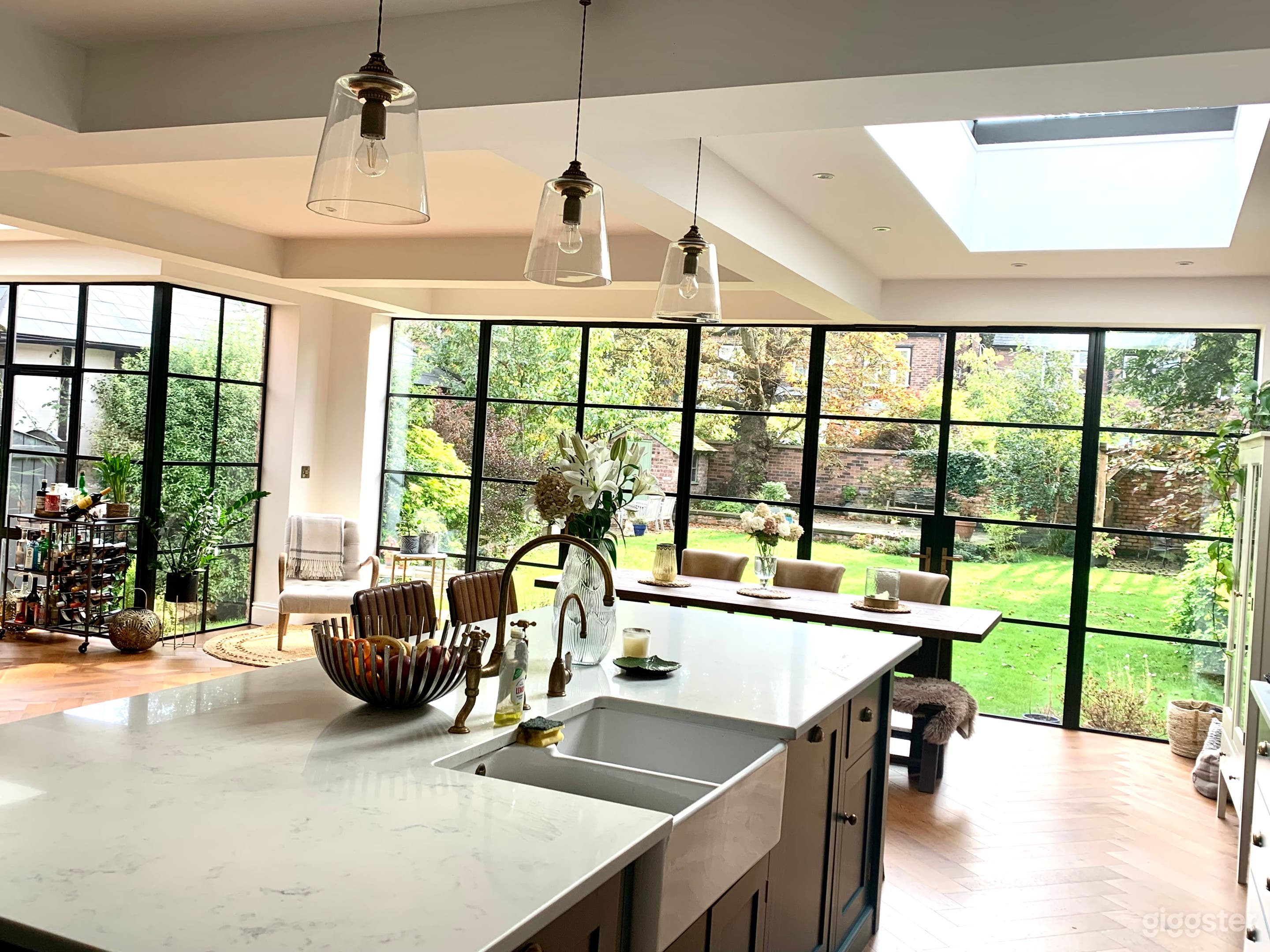 Kitchen / living space overlooking garden. Full crittal doors across back of house 