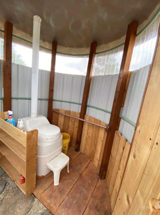 Roomy Red Tent with Access to Outdoor Kitchen Photo 4