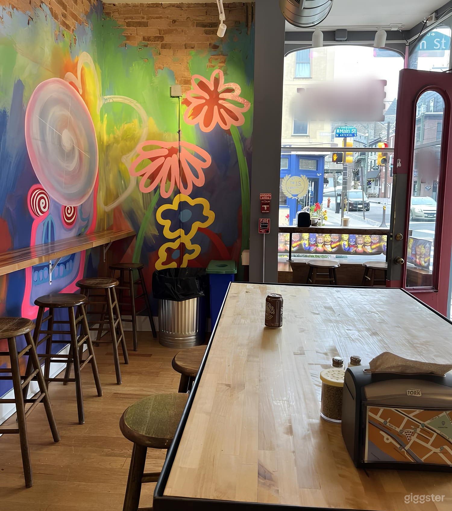 Seating area featuring murals and contributions from local artists 