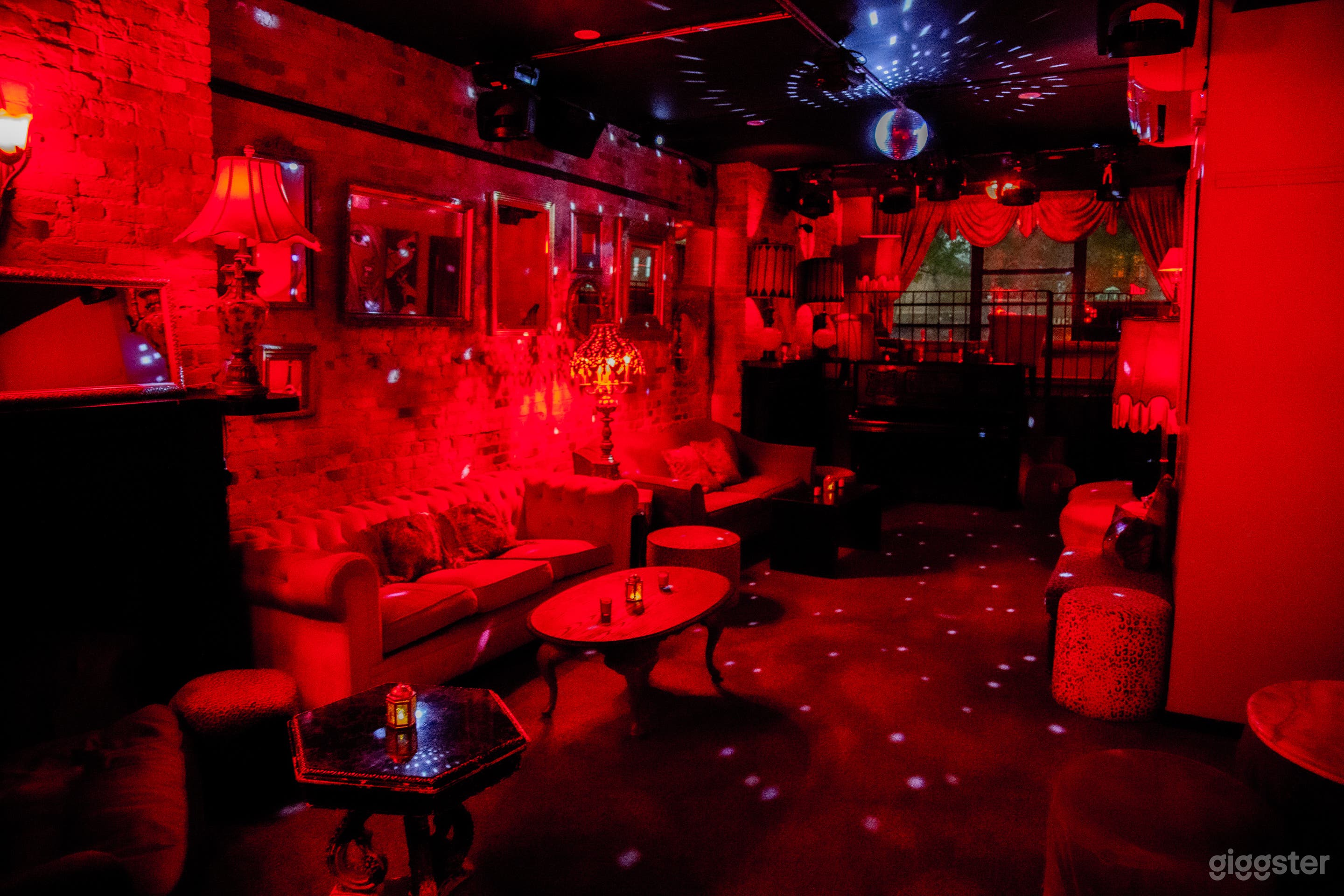 Our disco ball stays spinning on our dance floor in our Salon Rouge. 