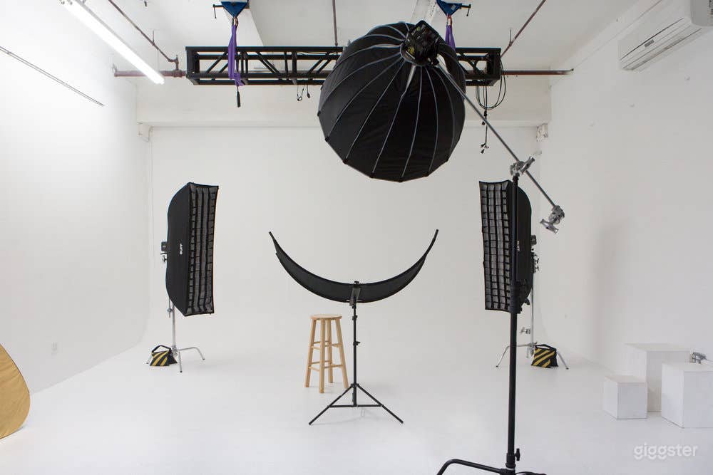 21' wide white cycwall. Deep studio with plenty of room to shoot with a longer lens.