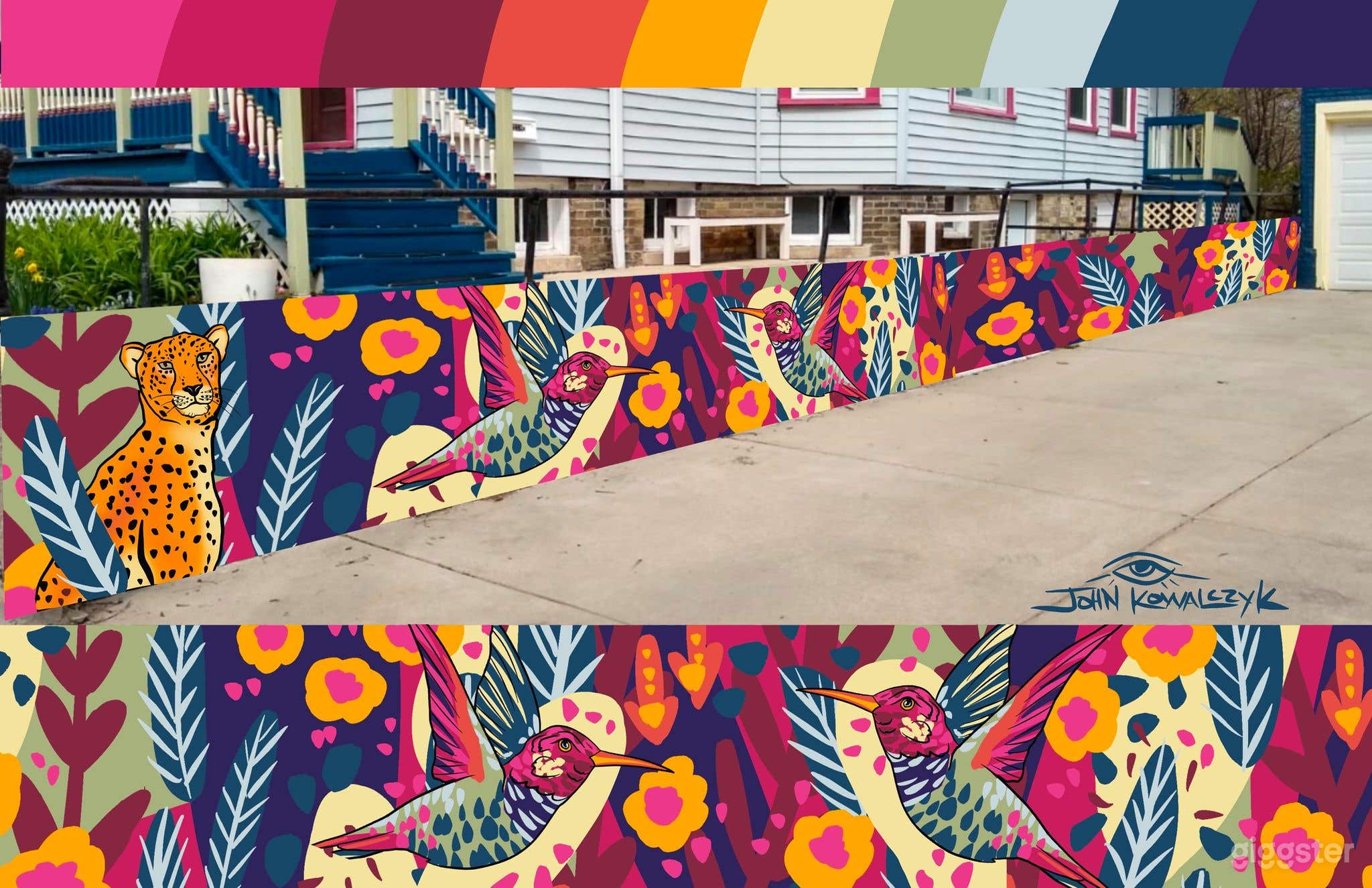 Mural in the parking lot done by artist John Kowalczyk