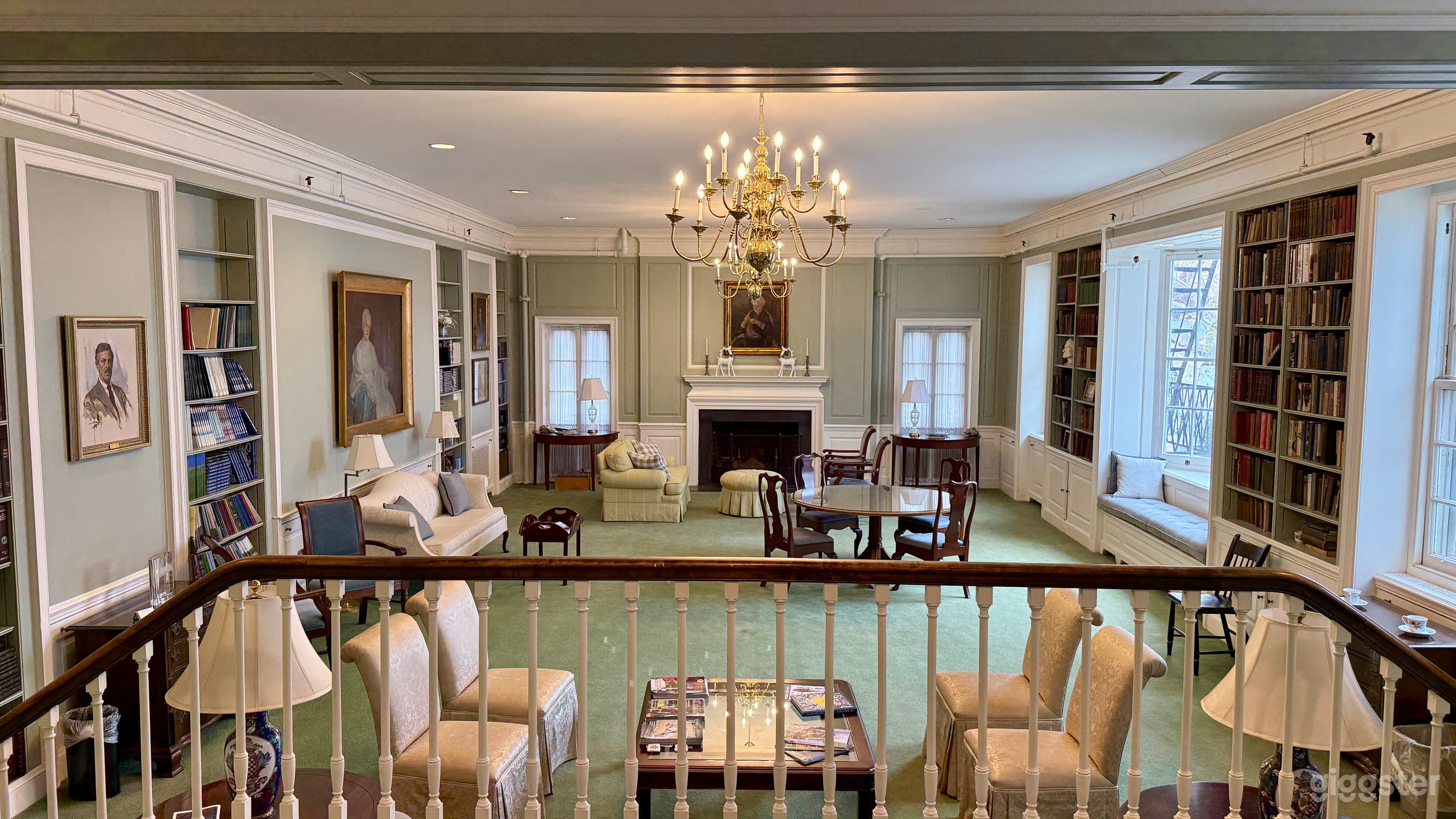 Inviting Living Sitting Room with Fireplace and Twin Stairs Photo 2