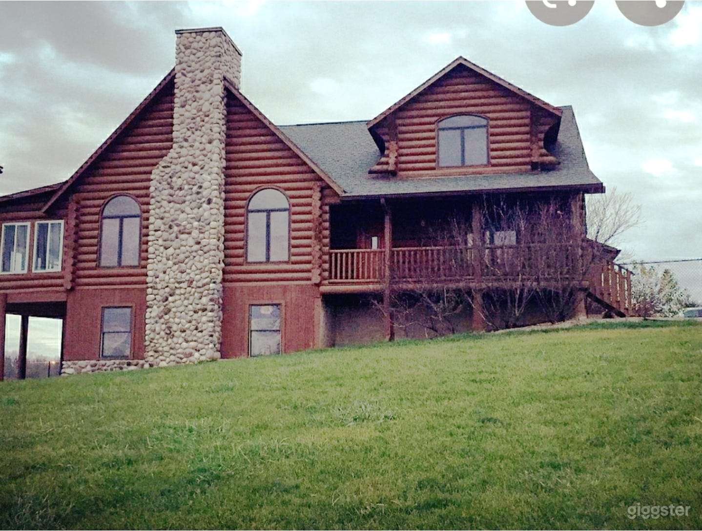 Log home overlooking  vineyard  on 34 acres in rural Iowa.  Breathtaking  views and a great place to gather.
