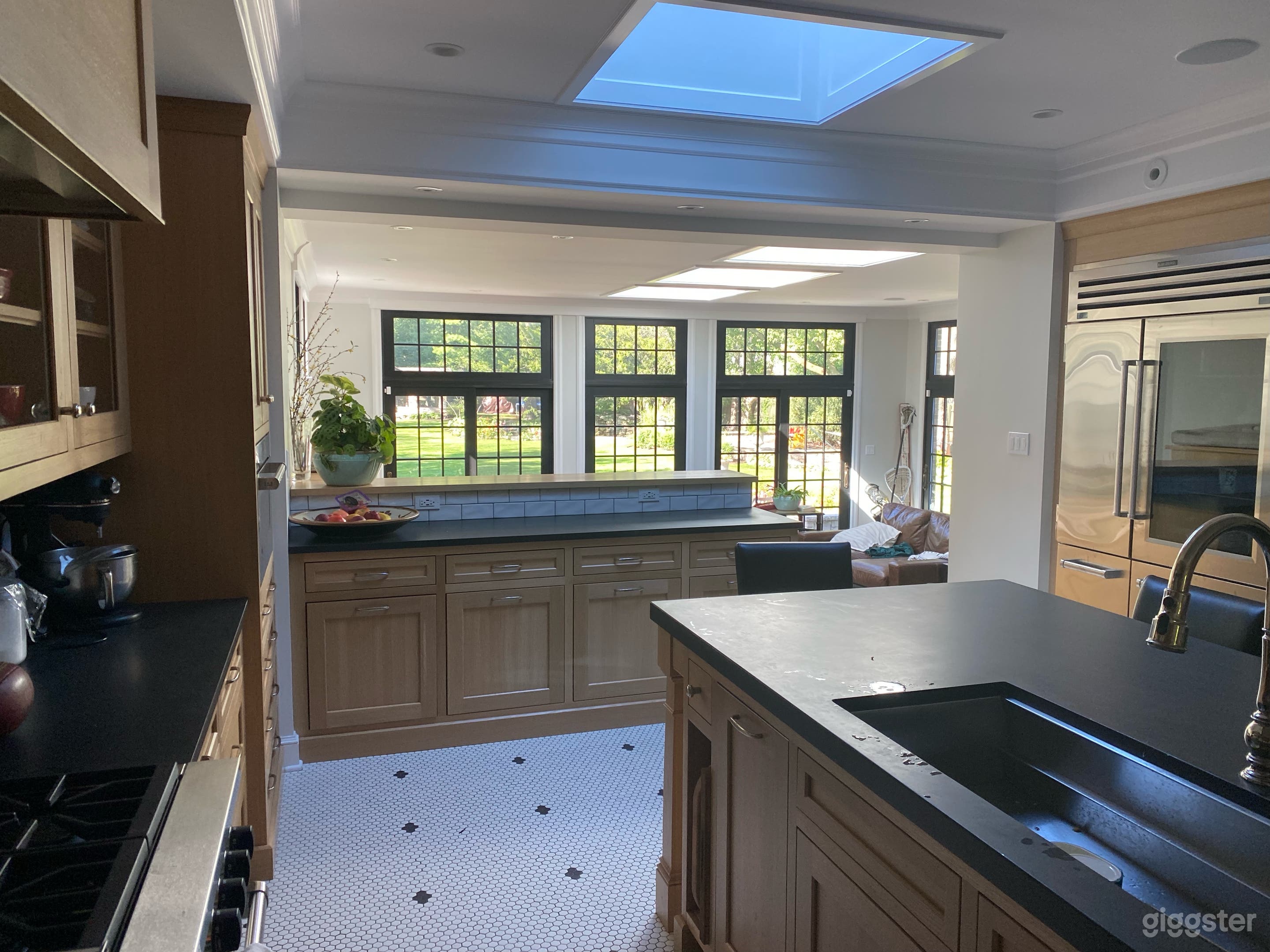 Kitchen overlooking family room and onto backyard