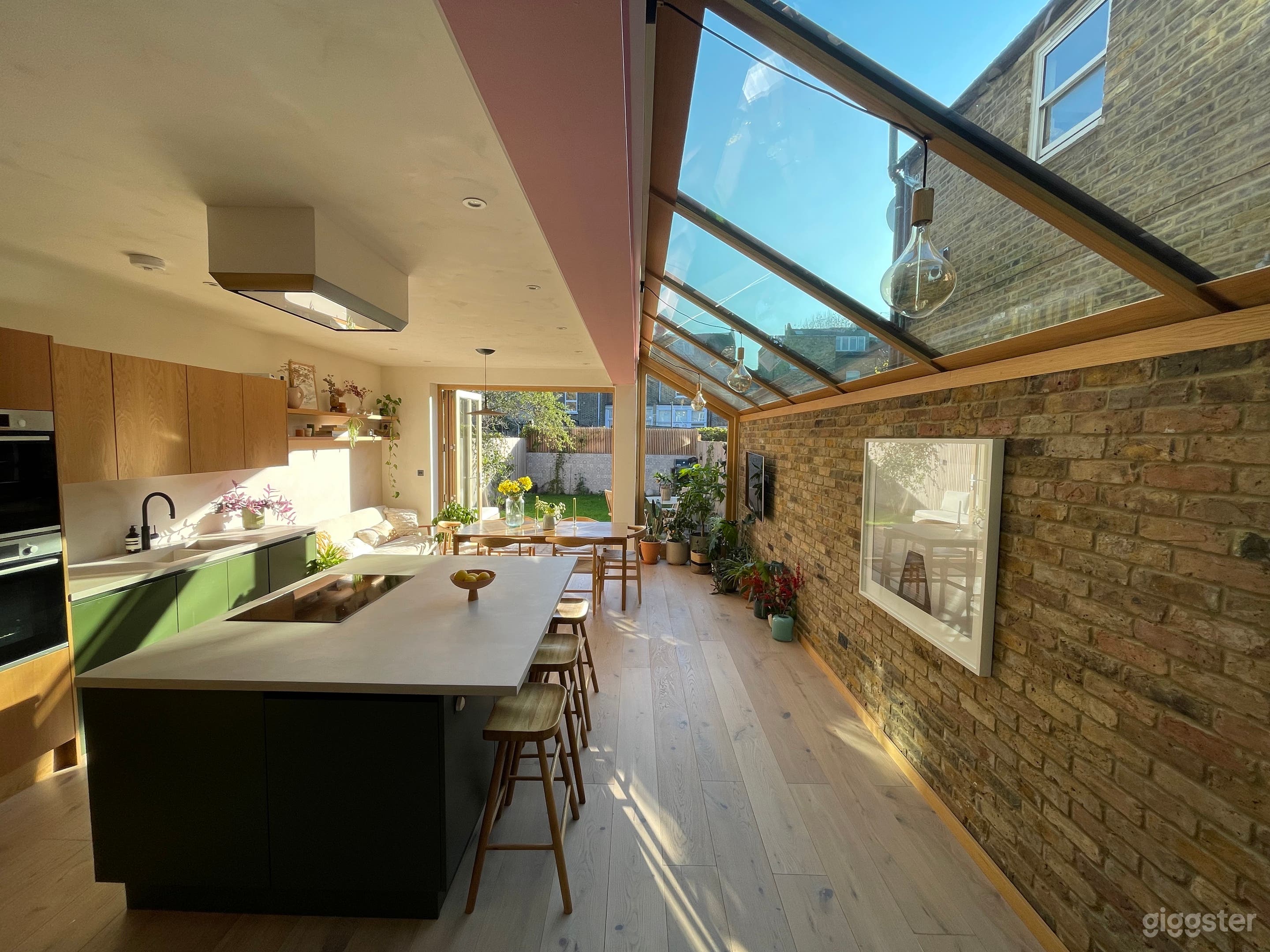 Open plan kitchen, brick wall, concrete wall and textured walls