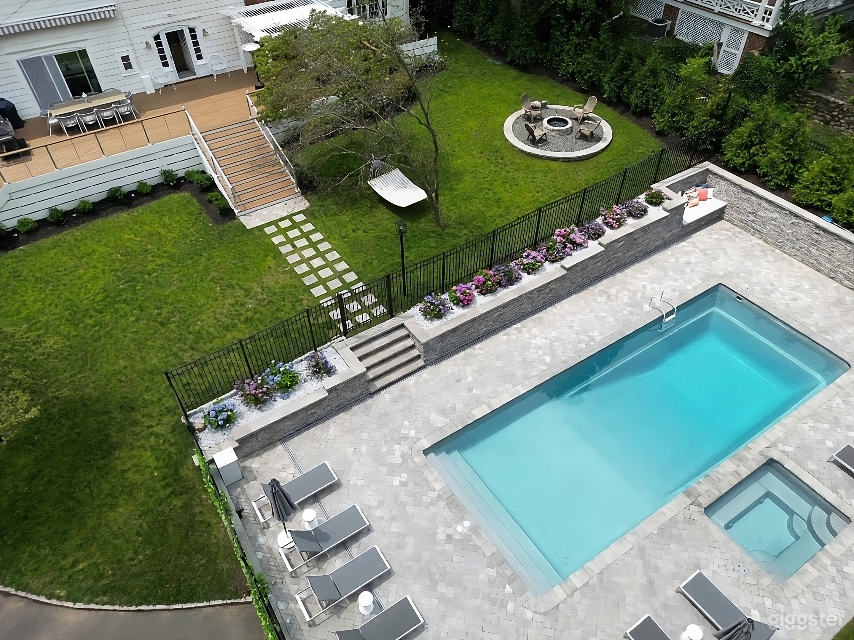 Exquisite Backyard Oasis with Pool Photo 3