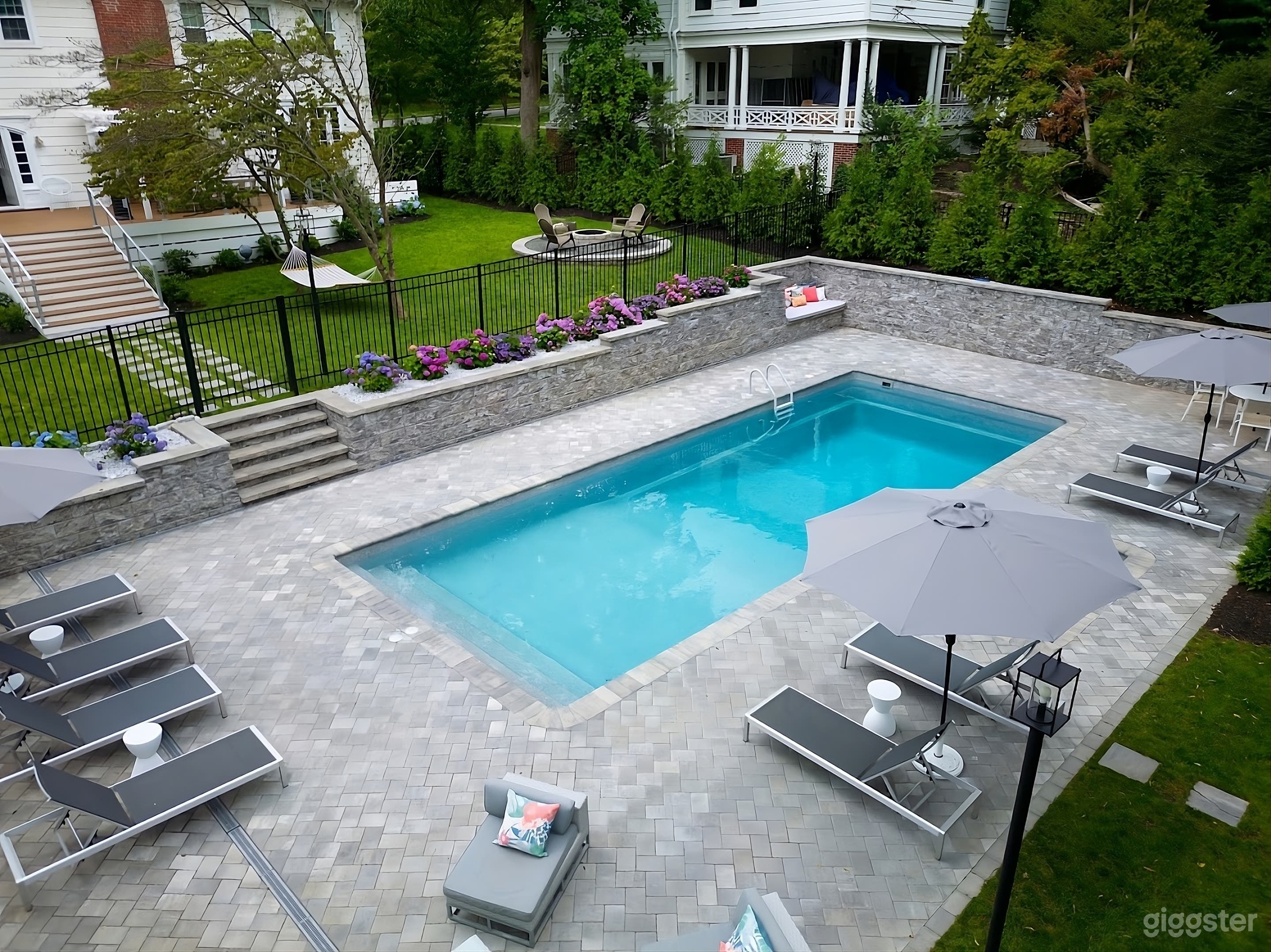 Exquisite Backyard Oasis with Pool Photo 2