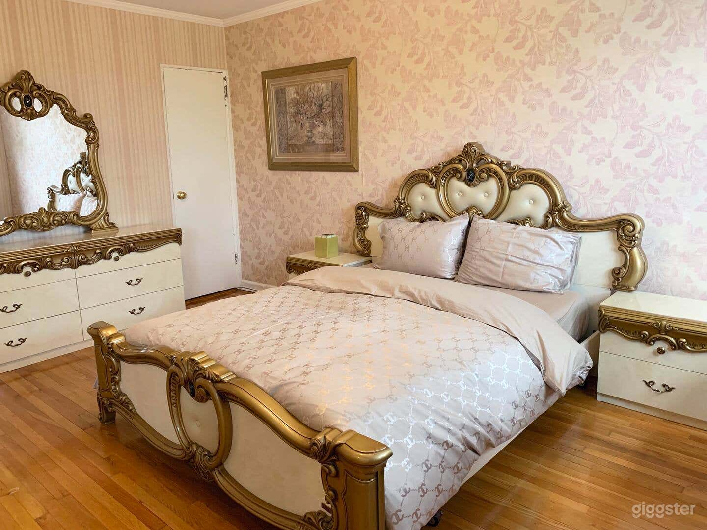 Bedroom #1: Master bedroom with a dresser, mirrored closet, and a desk
