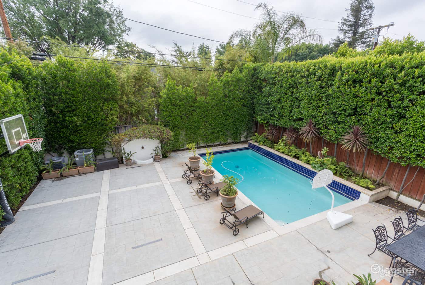 Panoramic Pool Area with Basketball Court Photo 4