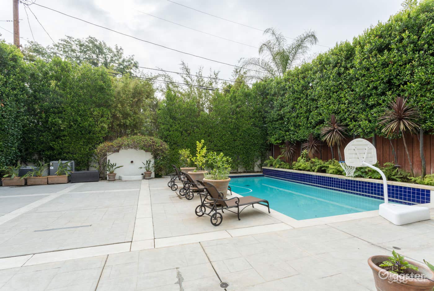 Panoramic Pool Area with Basketball Court Photo 2