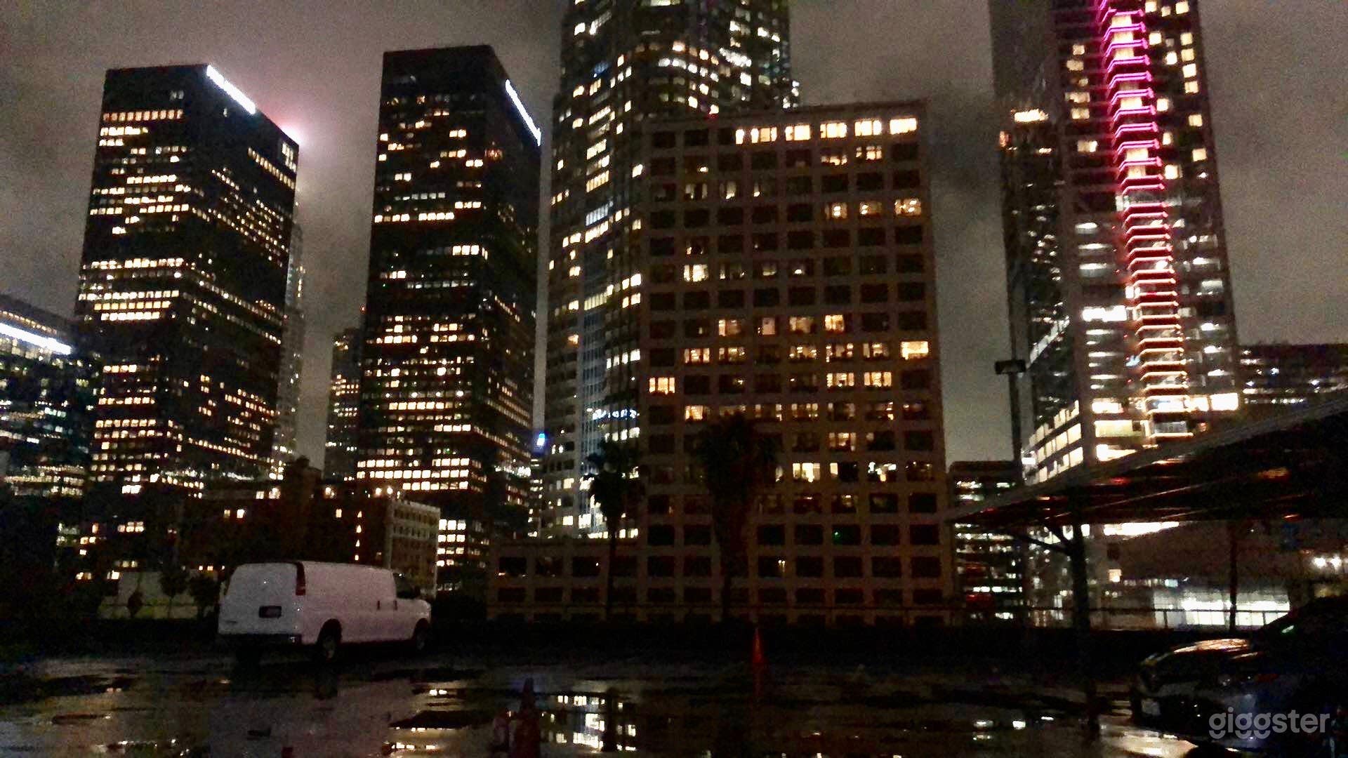 Downtown LA rooftop with city view and beautiful lights at night. 