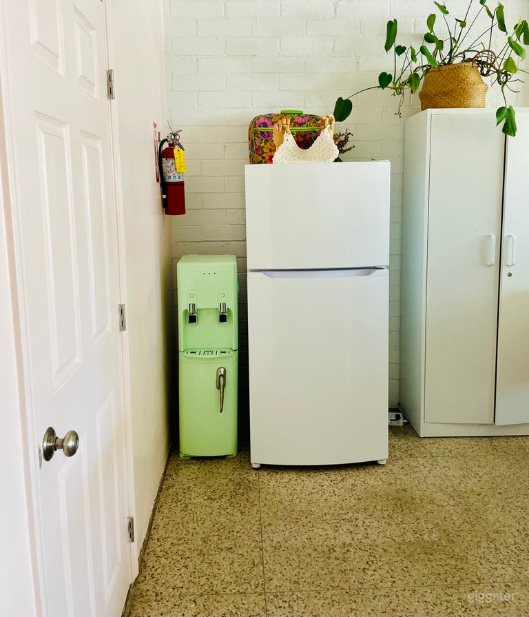  Full sized refrigerator and water cooler. 