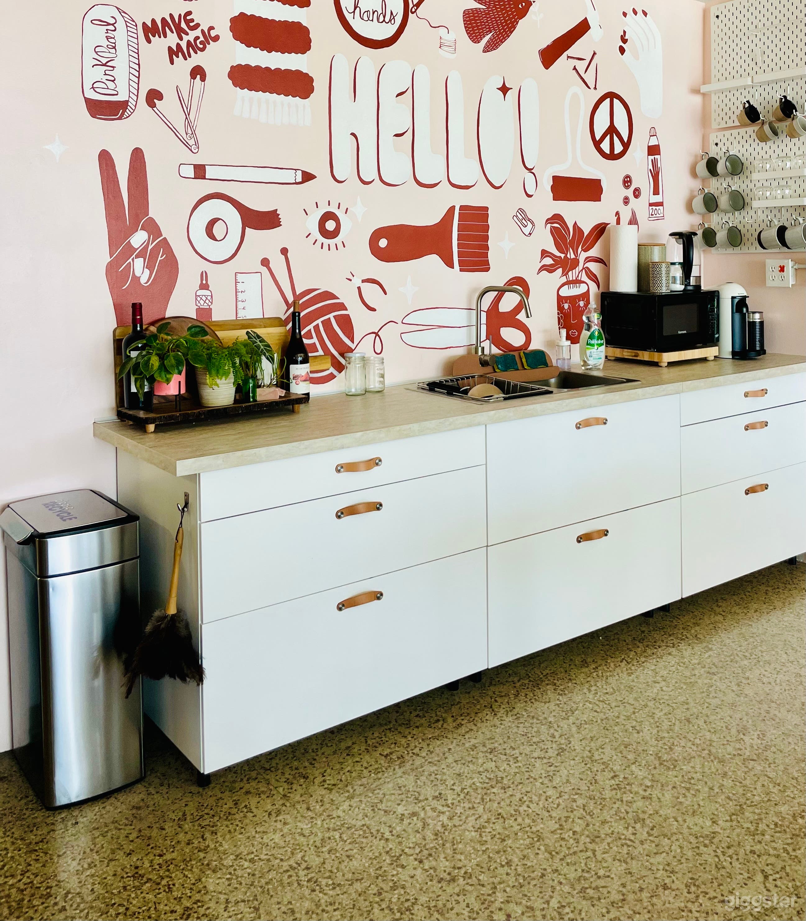Kitchen area with Nespresso Coffee machine, toaster and microwave.