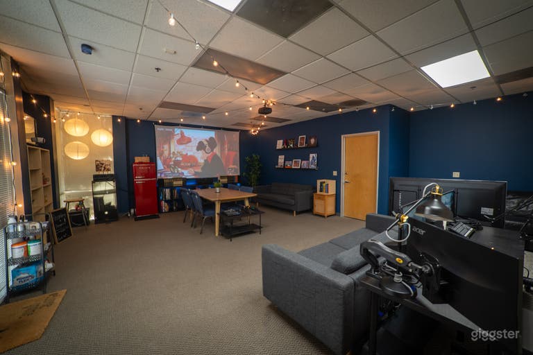  Wider shot of full room with couches and production booth area 