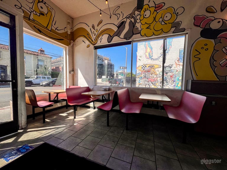  Vibrant Street-Art Burger Spot w/ Bold Murals, Booth Seating 