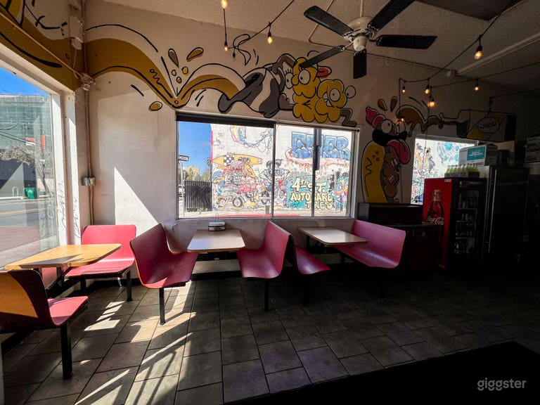  Vibrant Street-Art Burger Spot w/ Bold Murals, Booth Seating 
