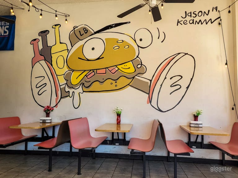  Vibrant Street-Art Burger Spot w/ Bold Murals, Booth Seating 