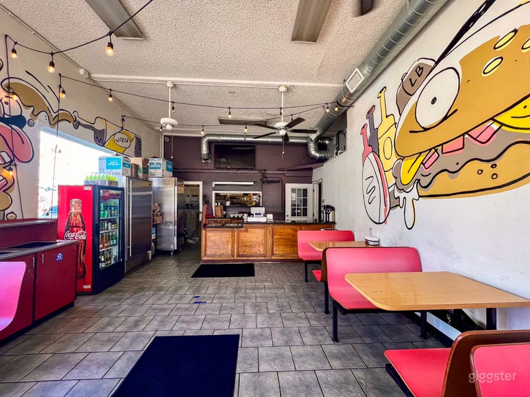  Vibrant Street-Art Burger Spot w/ Bold Murals, Booth Seating 