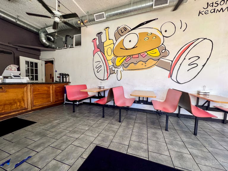  Vibrant Street-Art Burger Spot w/ Bold Murals, Booth Seating 