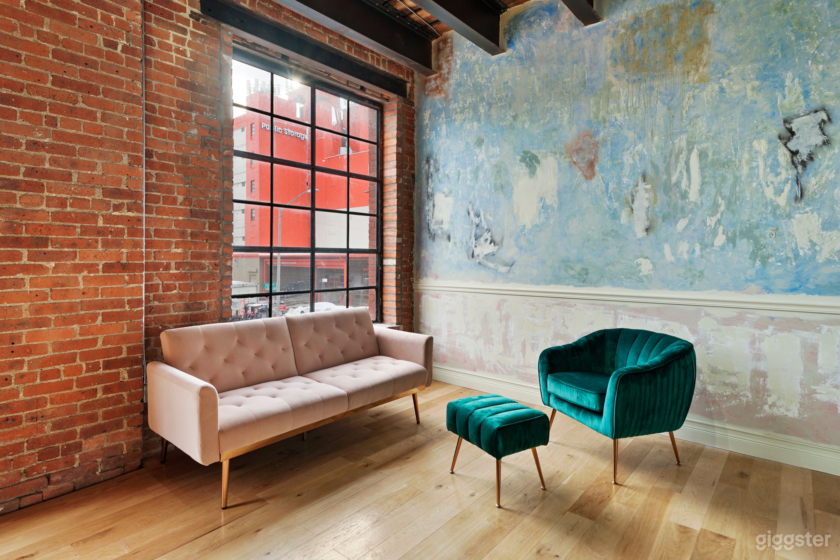 Elegant Clawfoot Tub and Historic Art Wall Photo 2