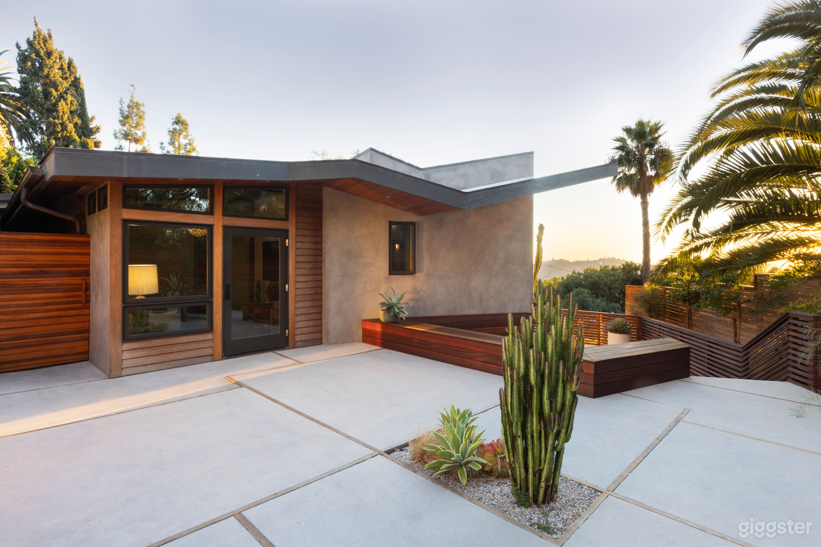 Exterior side yard with sunken seating and views