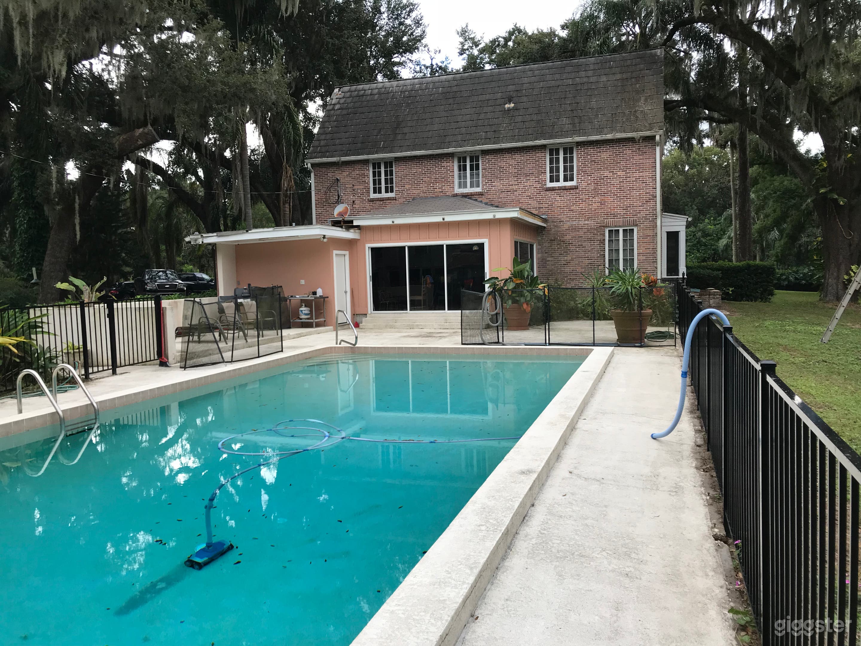 Rectangular pool with bathroom.