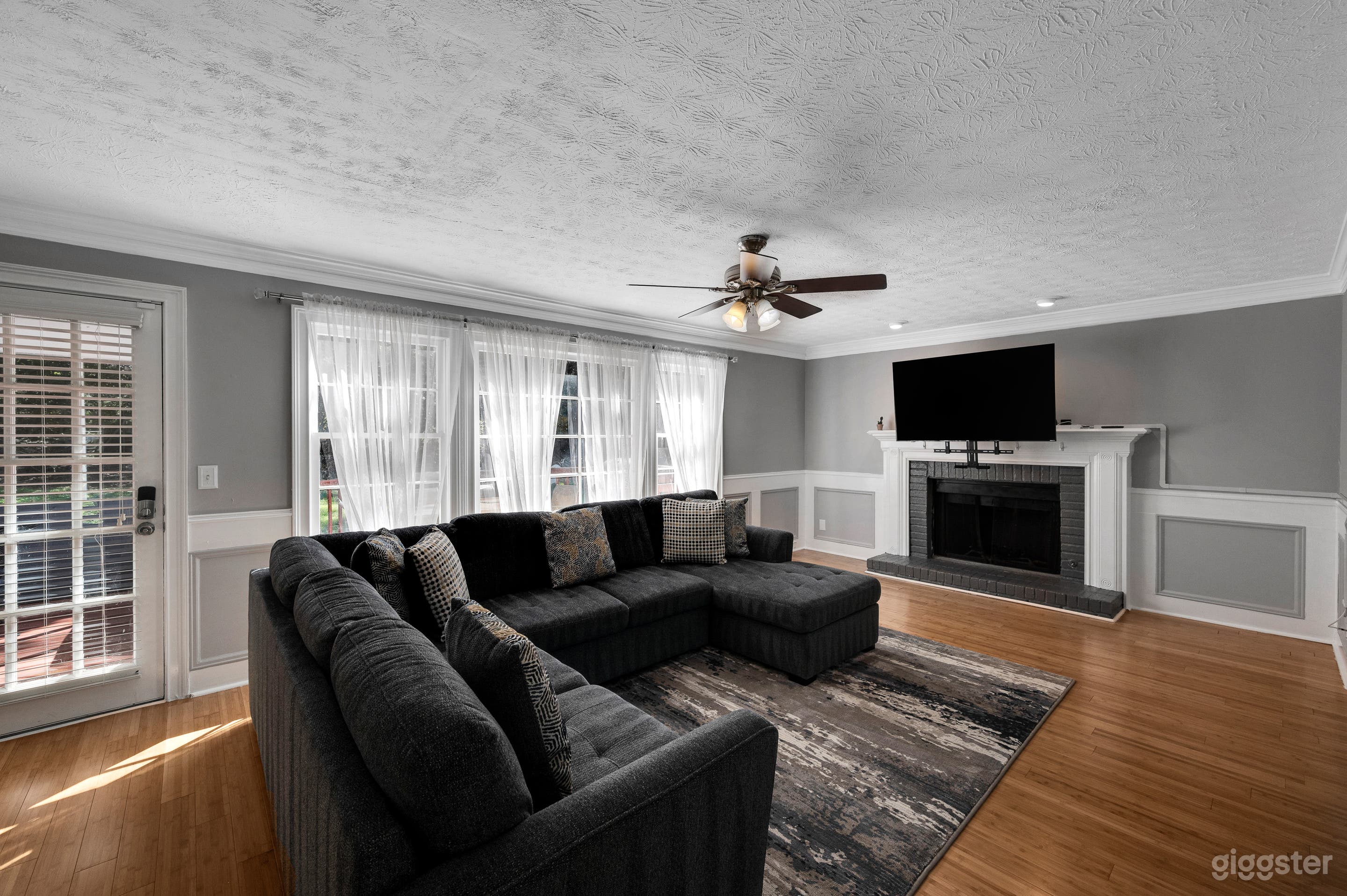 Living room with large windows and lots of natural light