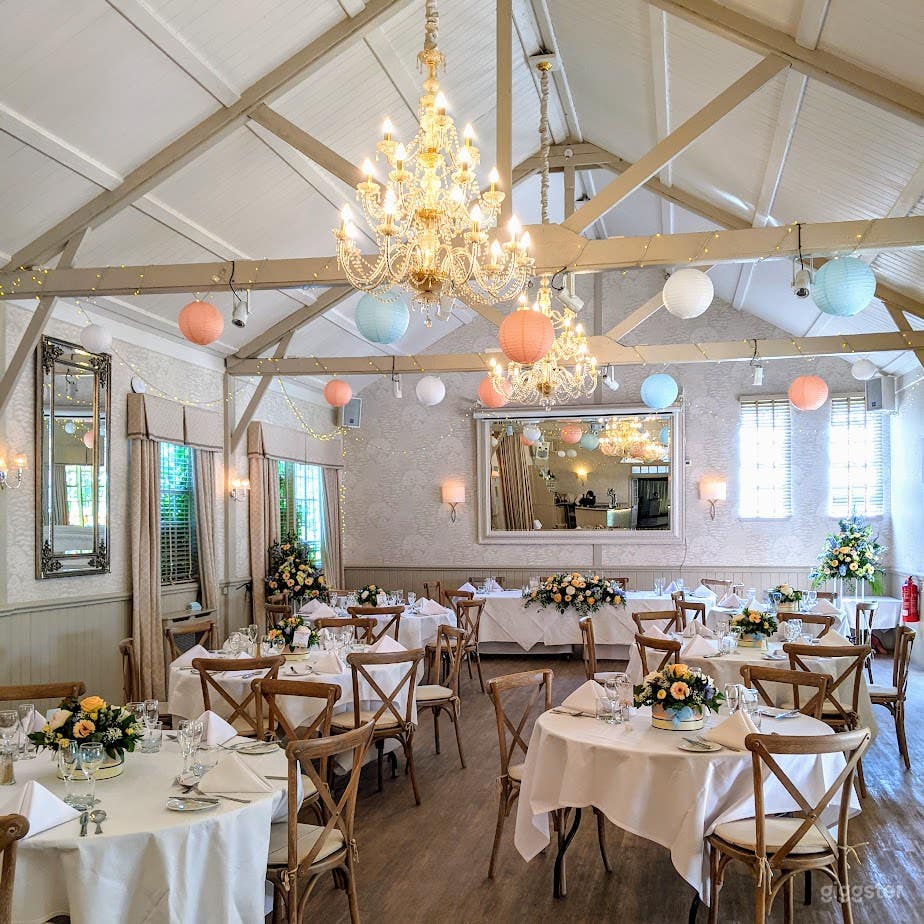 The decorative beams and chandelier lighting 