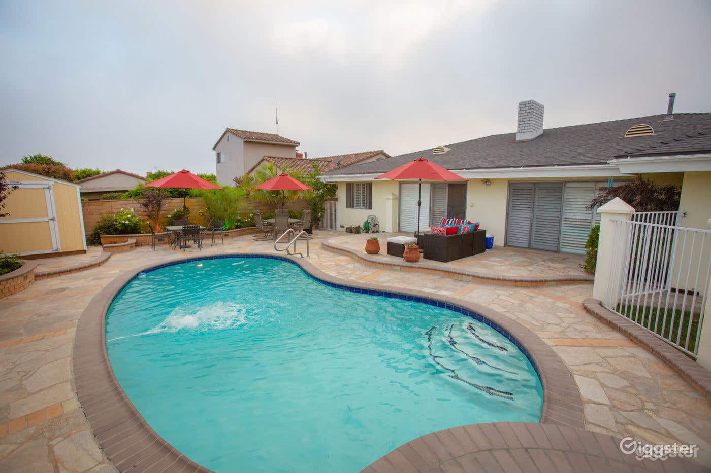 Quintessential Pool Area with Yard Access Photo 1