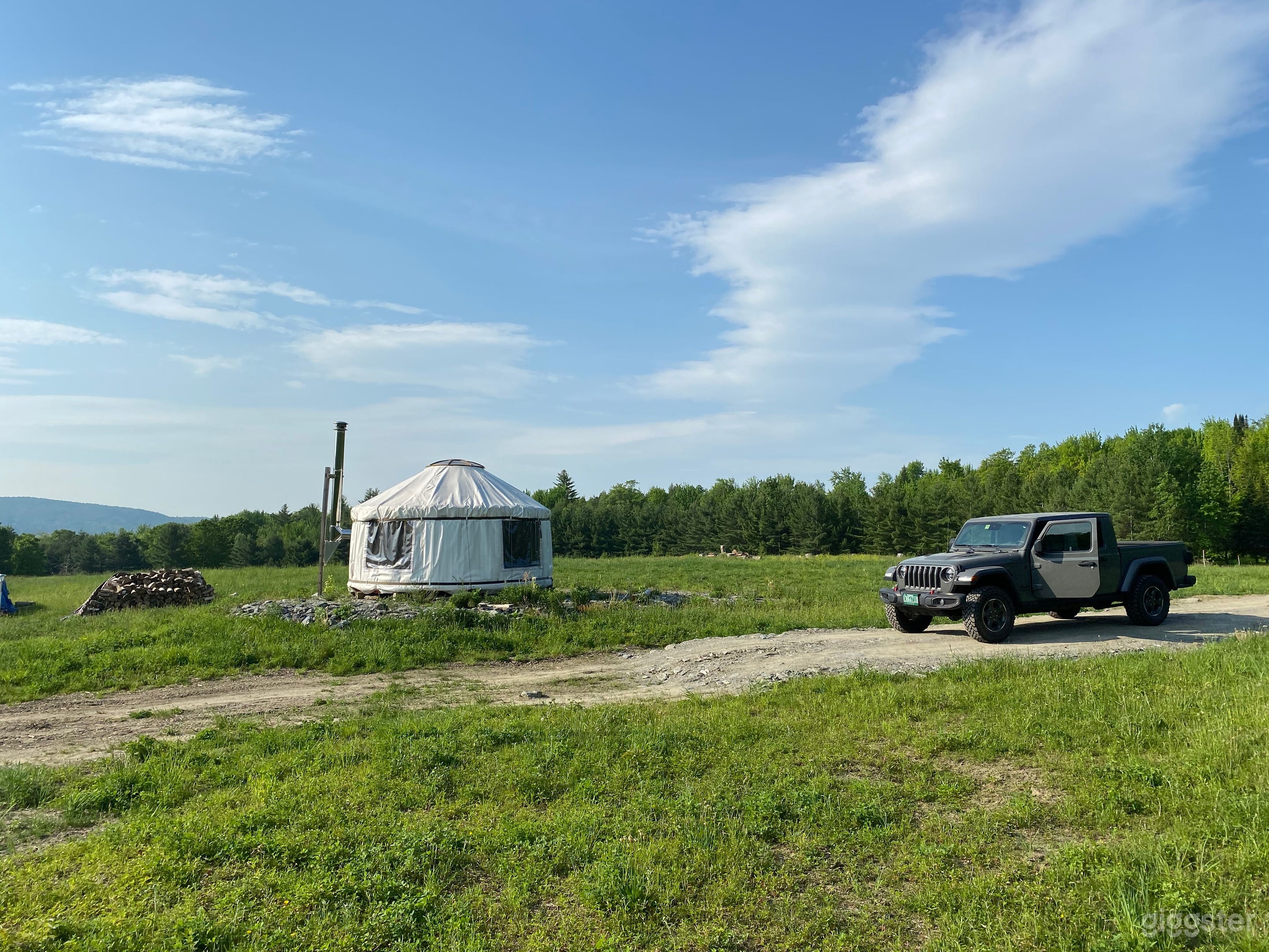 Morning at the yurt. Yurt is solar panel powered and wood stove heated with 2 cots. Fire pit outside. 