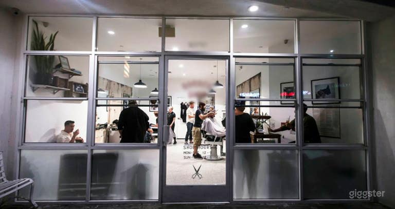  Sleek speakeasy lounge located behind barbershop 