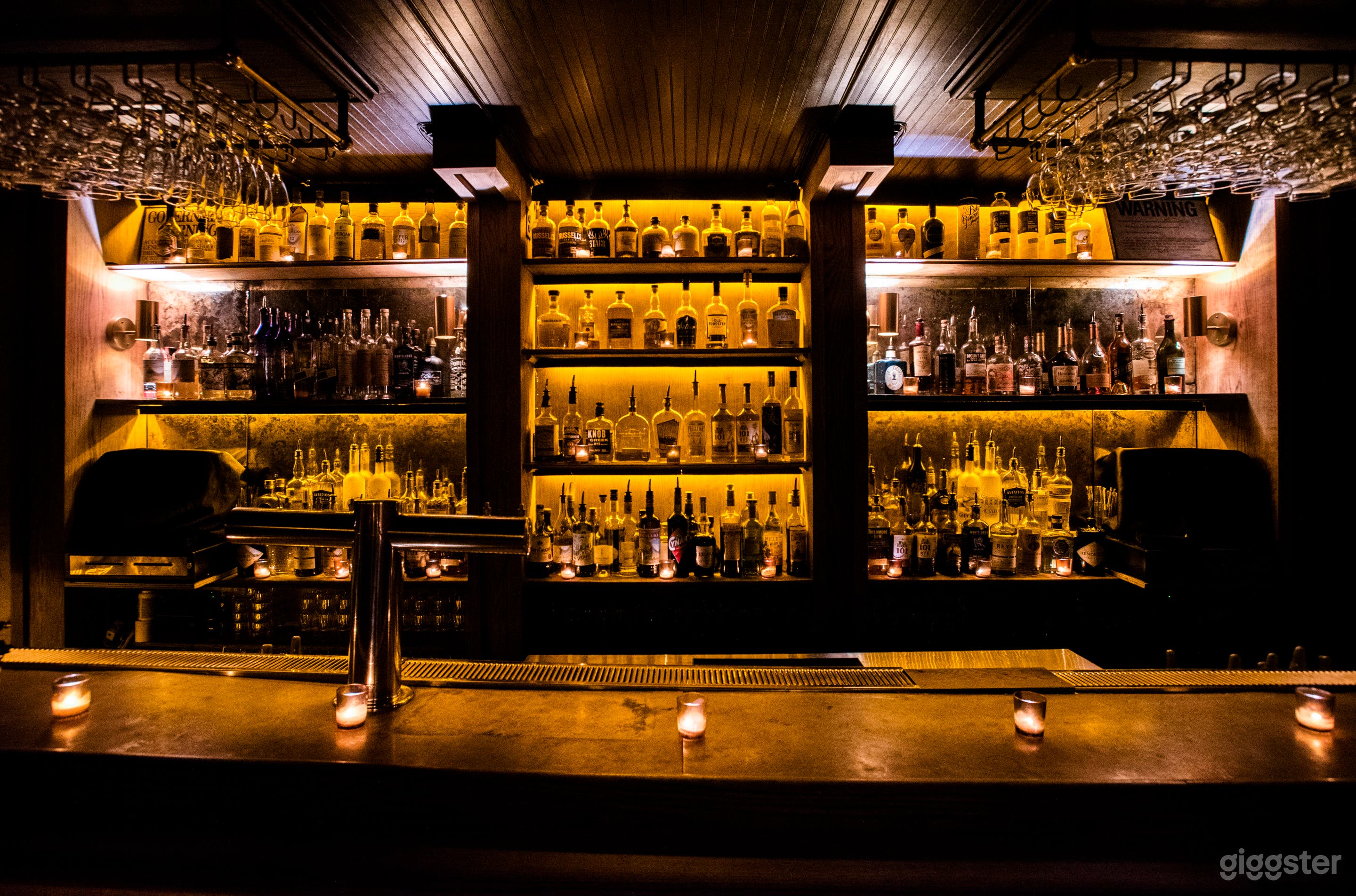 Sleek speakeasy lounge located behind barbershop Photo 1